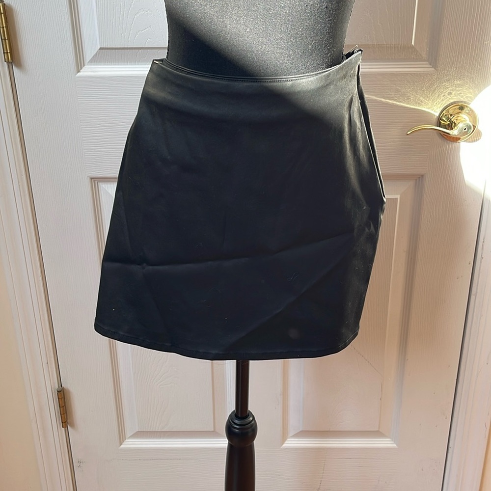 Coated denim stretch mini skirt